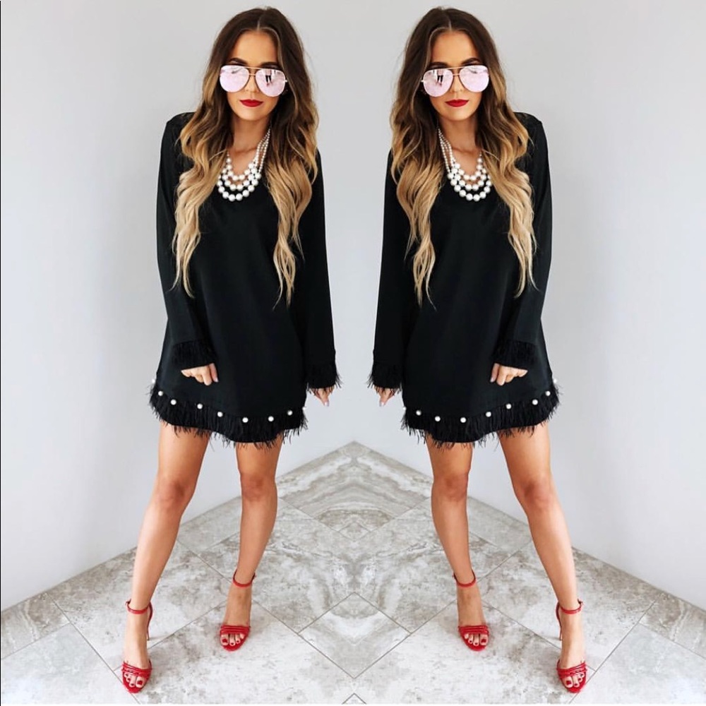 Black dress with pearl details